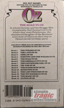 Load image into Gallery viewer, The Road To Oz by L. Frank Baum Paperback Back Cover Art